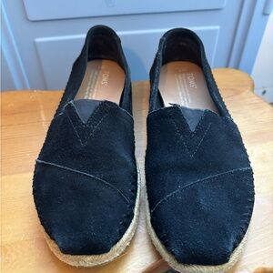 TOMS slip on black shoes.  Women’s Size 7. Good condition.